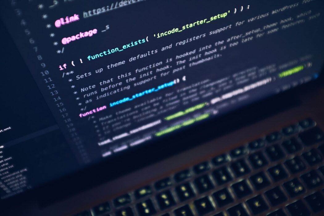 Close up of computer wit code on it