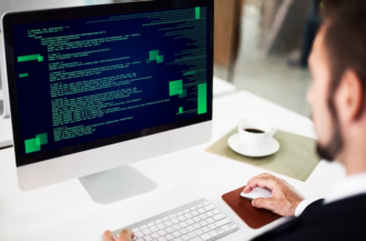 A man is engaged in programming